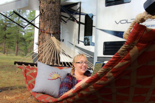 girl-reading-hammock-glamping