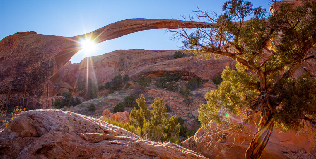 sunburst through landscape arch