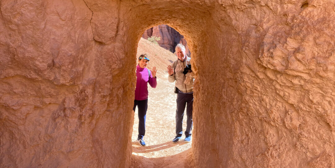 people in queens garden rock doorway