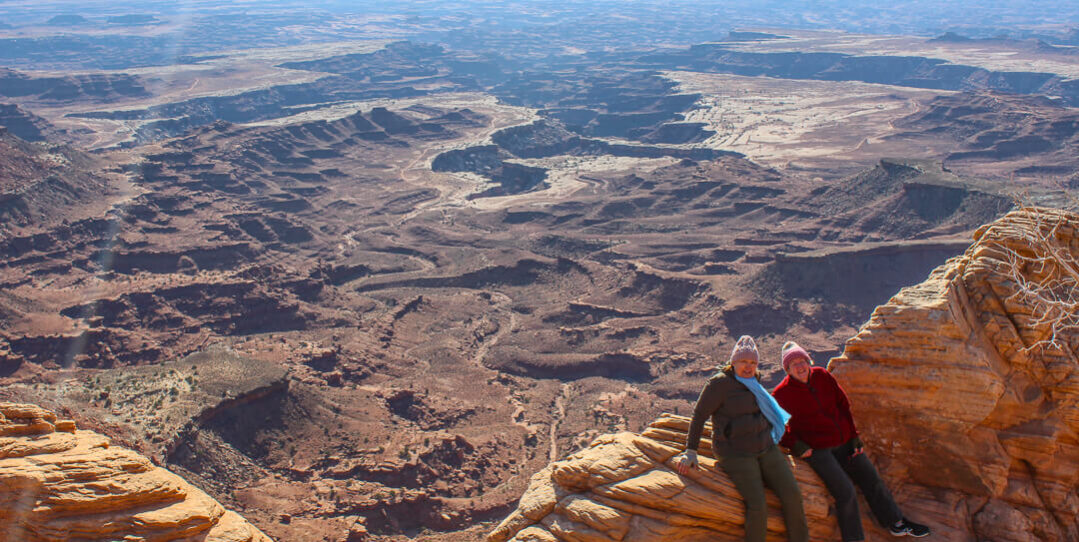 women overlooking canyonlands national park